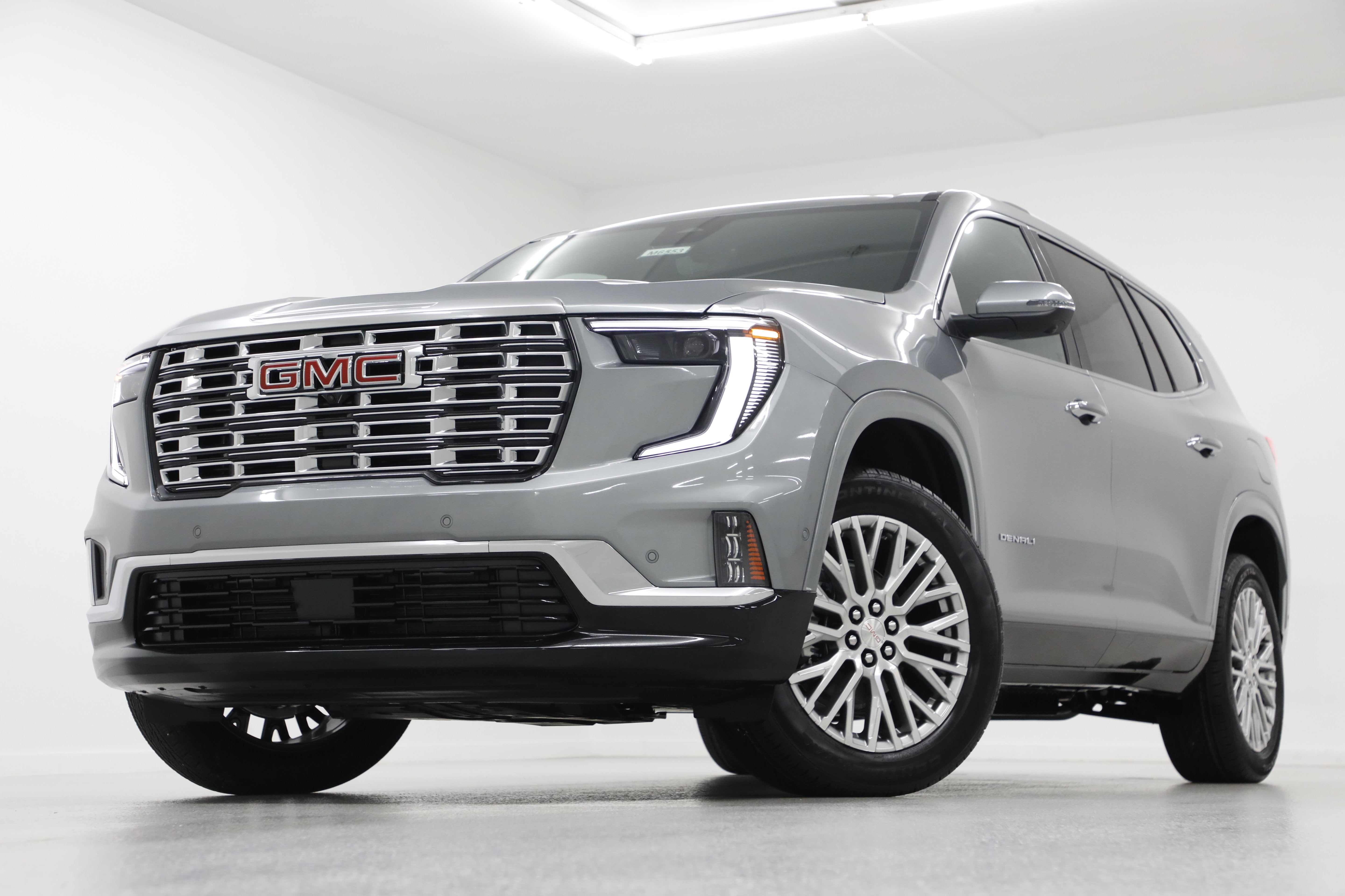 2026 GMC Acadia Denali in Sterling Metallic — front three-quarter view