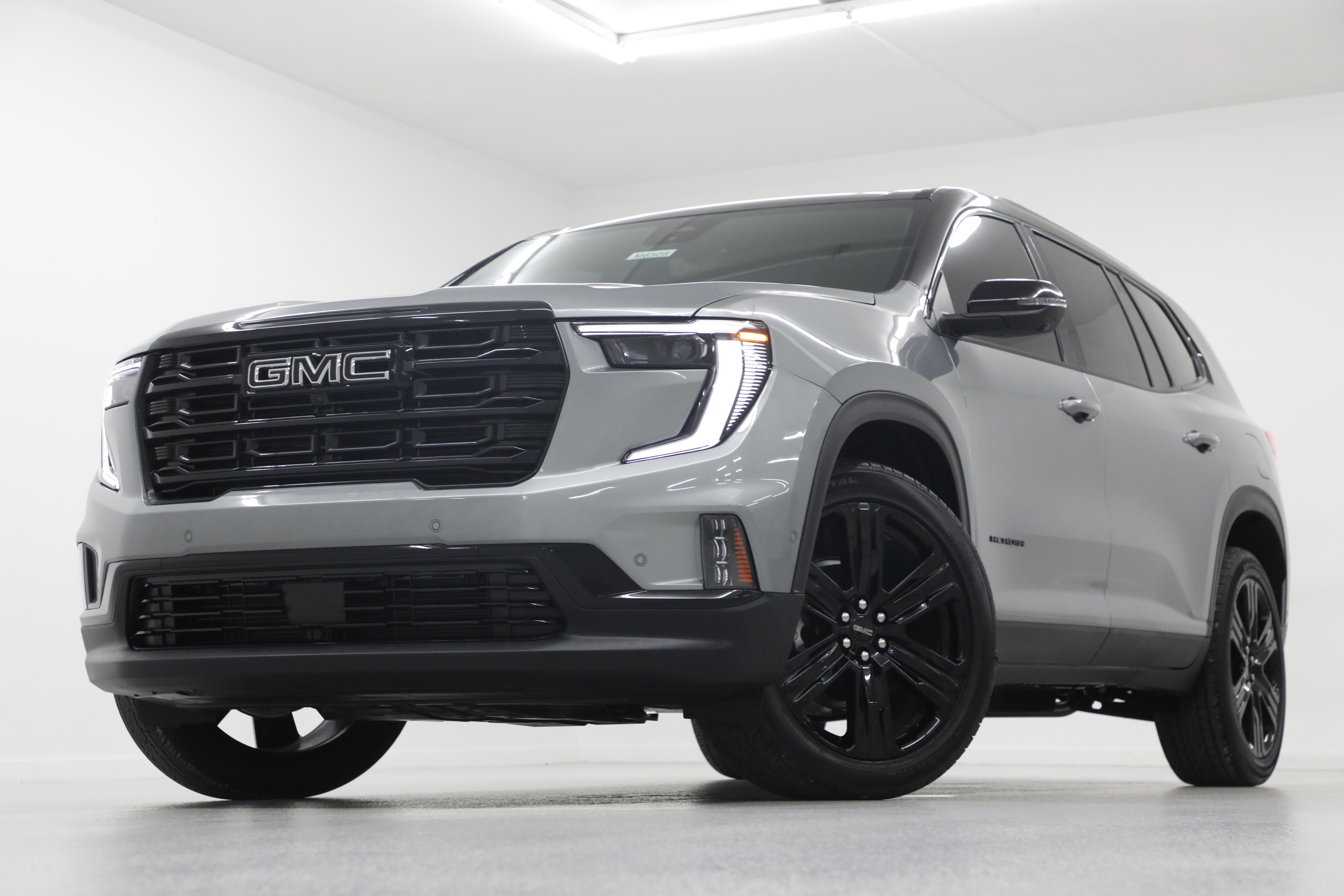 2026 GMC Acadia Elevation in Sterling Metallic — front three-quarter view