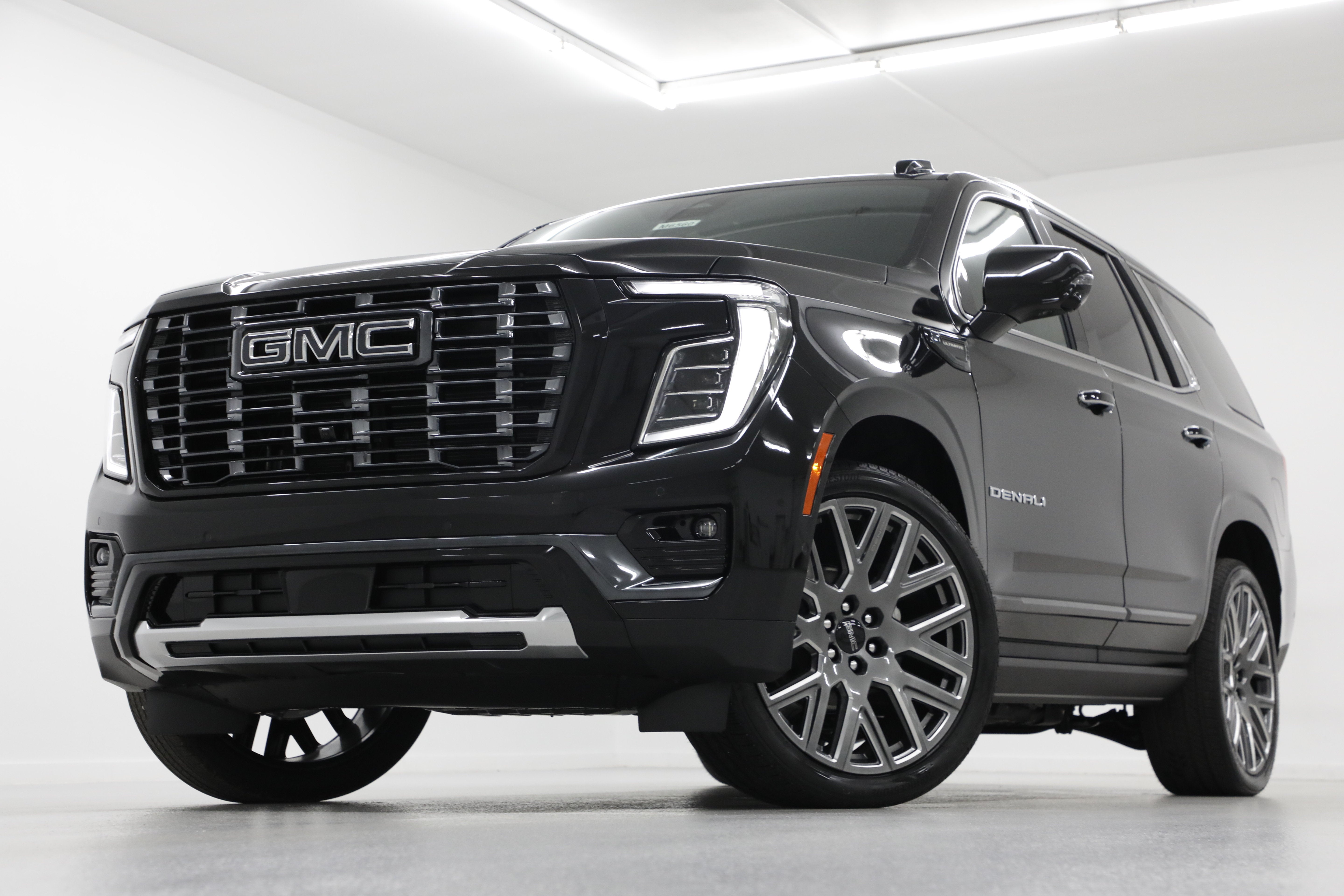 2026 GMC Yukon Denali Ultimate in Onyx Black — front three-quarter view